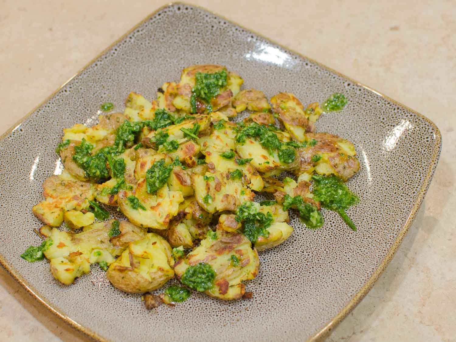 Crispy Smashed Baby Potatoes with Garlic and Rosemary Oil
